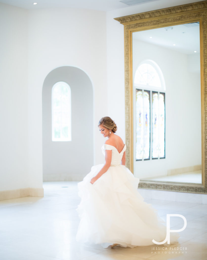 Bride twirling in dress