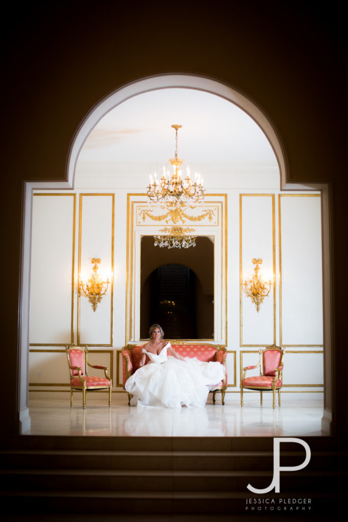 Bride on Couch at Chateau Cocomar