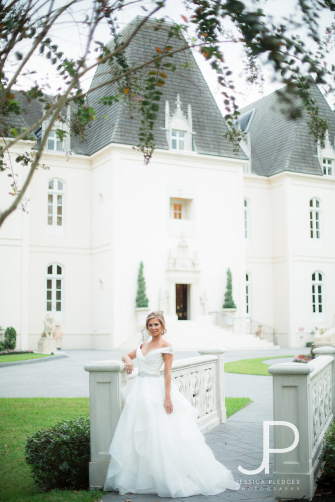 Bride on bridge at Chateau Cocomar